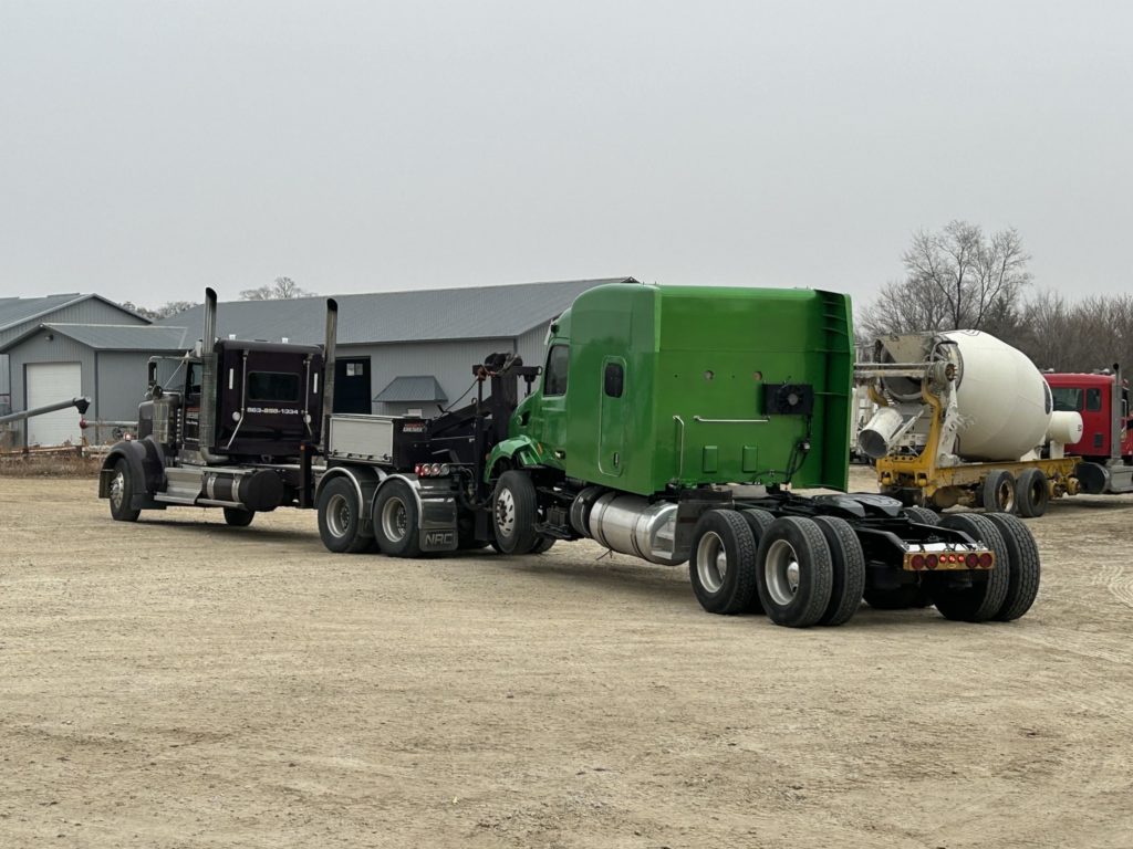 red, black, and green trucks