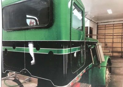 Green and Black Semi Truck Cab