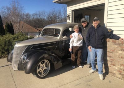Happy customers with their restored car from RPM Revival