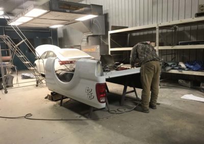 man working on truck bed